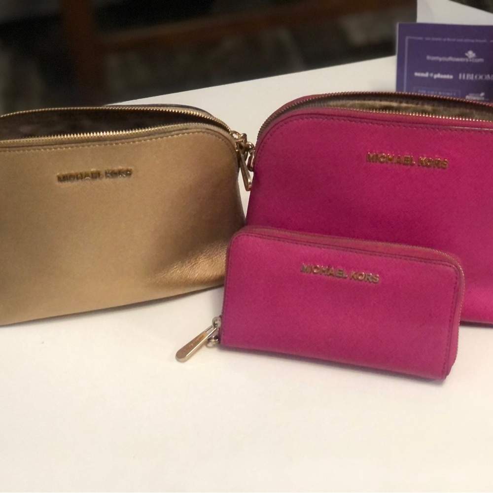 Set of two Michael Kors purses one includes a wallet used but loved.